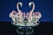 Kristallen zwanen met rose grind in hals op ronde spiegel