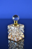 Luxe Kristallen Parfumflesje met Gouden Details